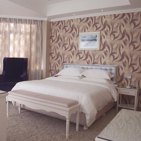 Xinyijia City Hotel Urumqi Esterno foto